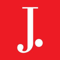 J.